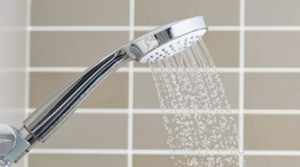 Soak the showerhead in vinegar