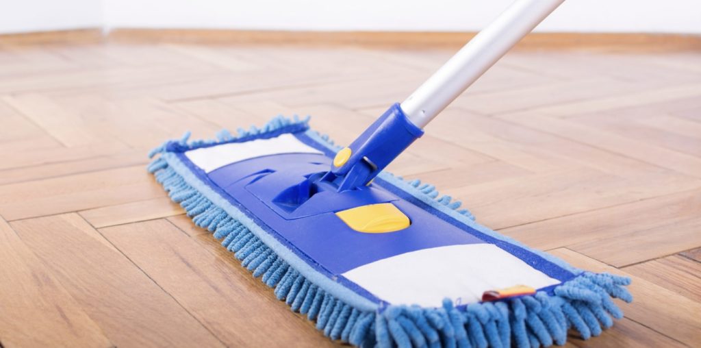 Apply the linoleum cleaner with the mop