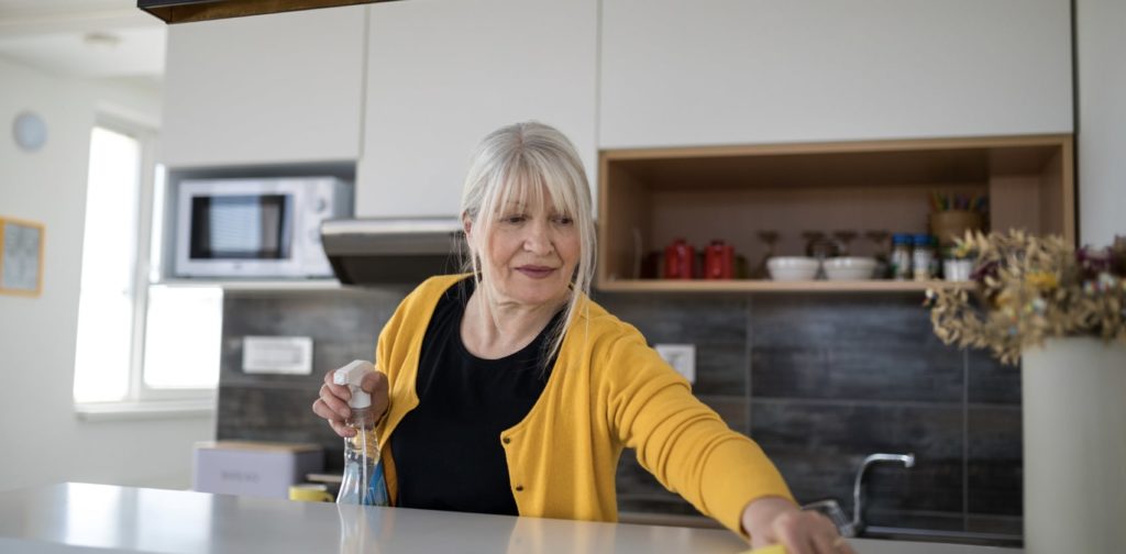 Scrub off dirt and oil from the granite