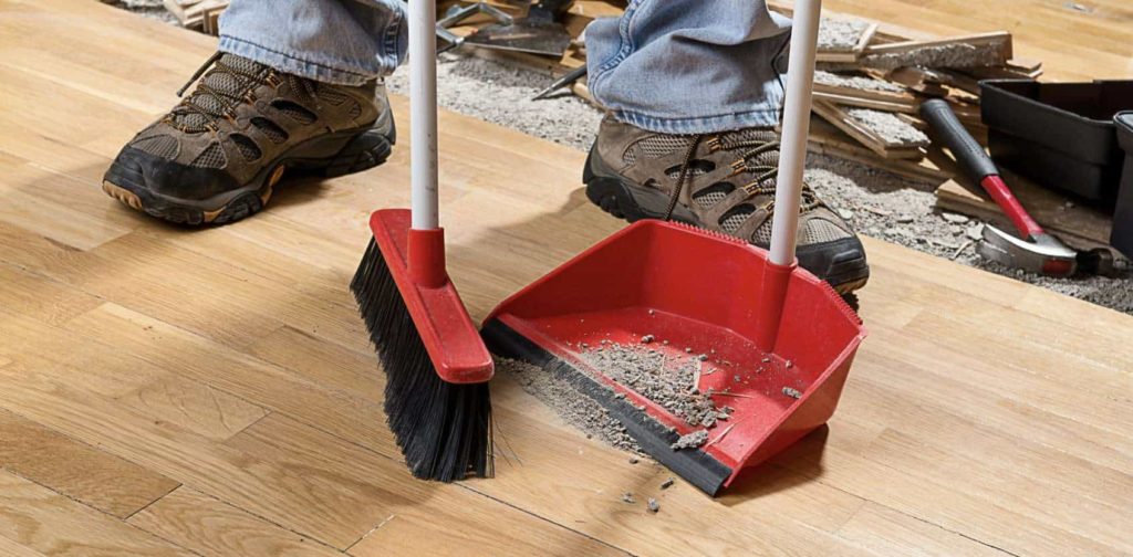 Sweep the linoleum to remove dirt and dust