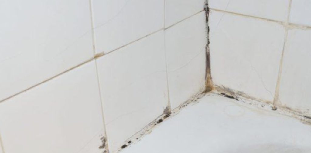 Should I remove an aged shower caulking